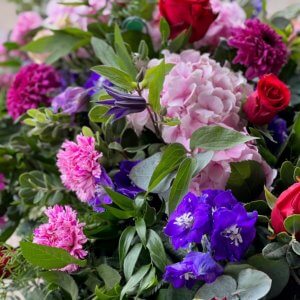 Vibrant Cottage Garden Coffin Spray