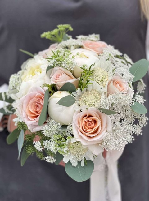Brides-Peach-Roses-Peonies-and-Scabious-Bridal-Hand-Tied-scaled.jpg