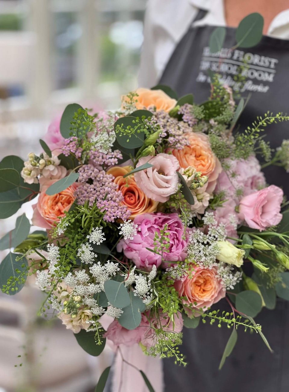 Brides-Peaches-and-pink-neutral-Bridal-Hand-Tied-scaled.jpg